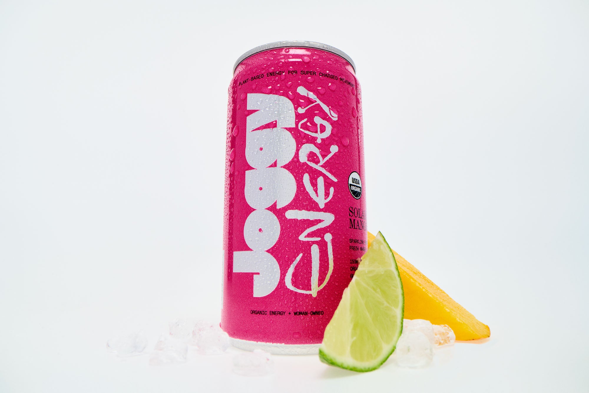 Pink energy drink can with lime and pineapple on a white background