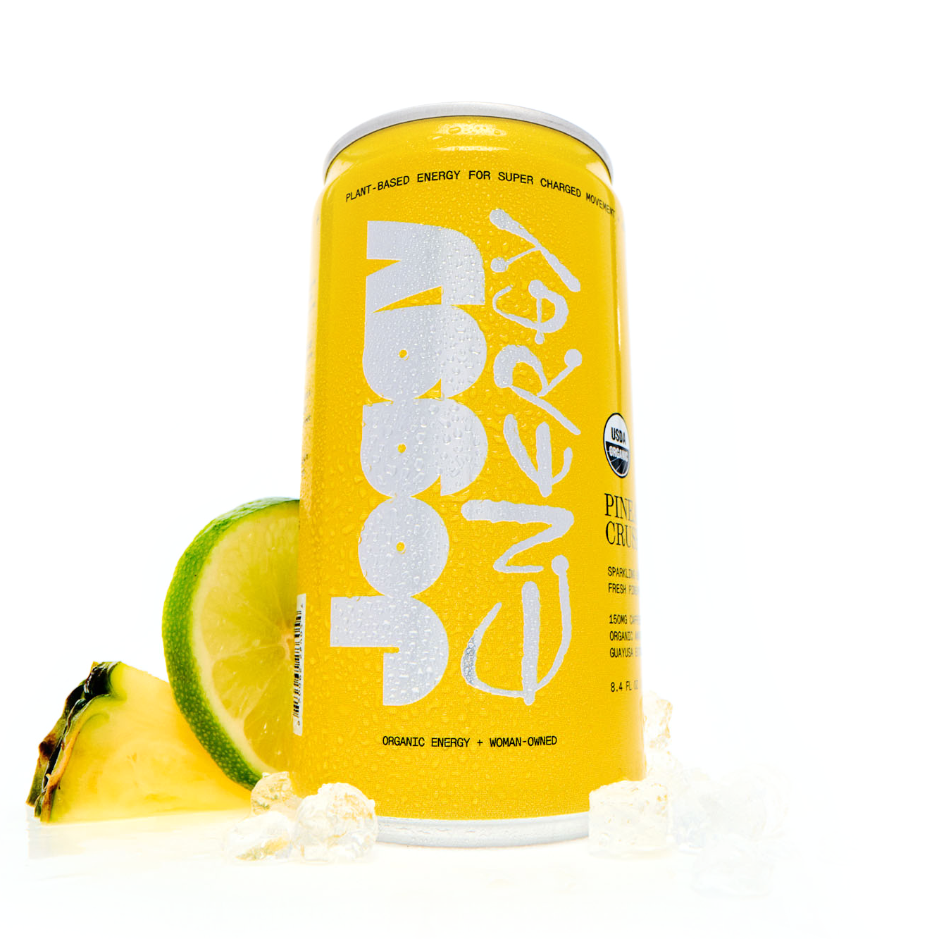 Yellow energy drink can with pineapple and lime slices on a white background